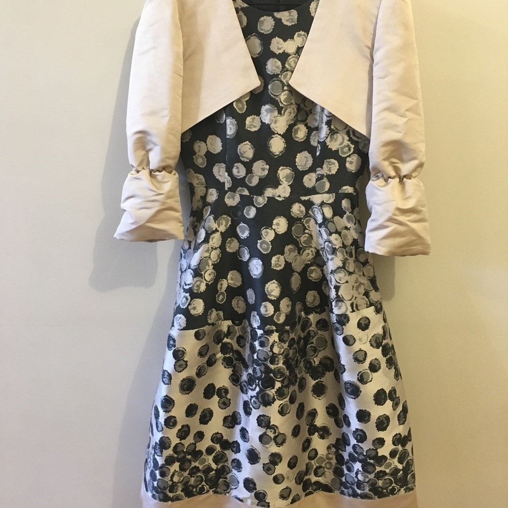 Magnificent women’s Carolina Herrera jumper with custom matching short blazer.
